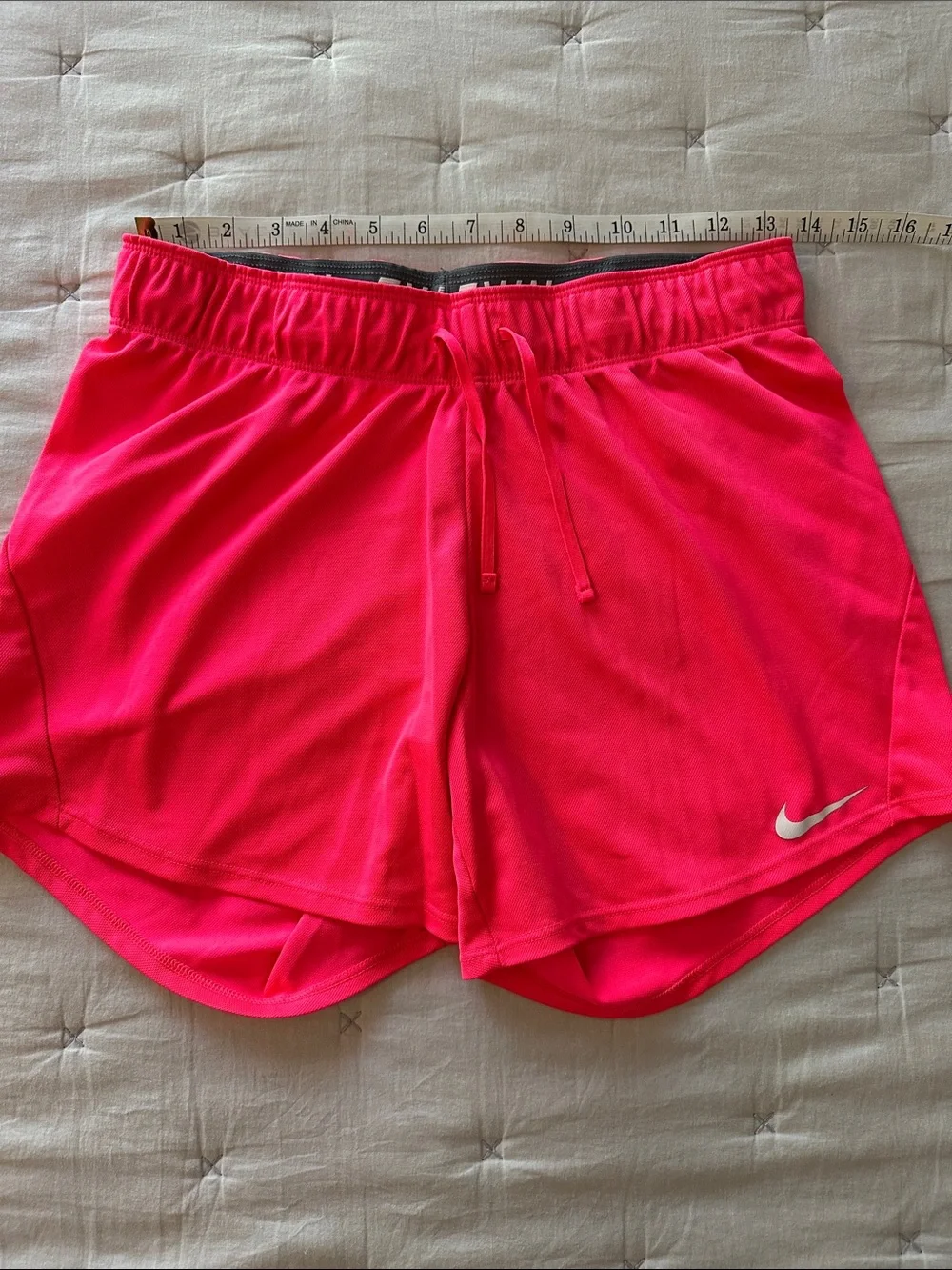Nike Women's Neon Pink Athletic Shorts with Swoosh
